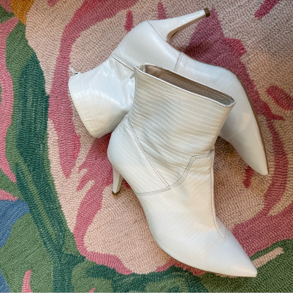 Free People- back zip white ankle boot with 3 inch heel. Pre worn condition 7.5